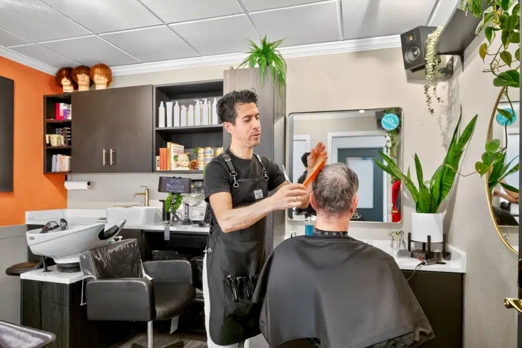 Men's hair stylist in Jacksonville, FL, offering precision haircuts and personalized men's hairstyles at Richard McGraw Hair Design.
